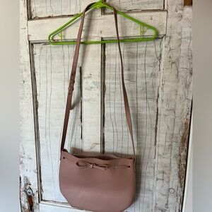 Vegan faux leather pink bucket purse.  Like new.